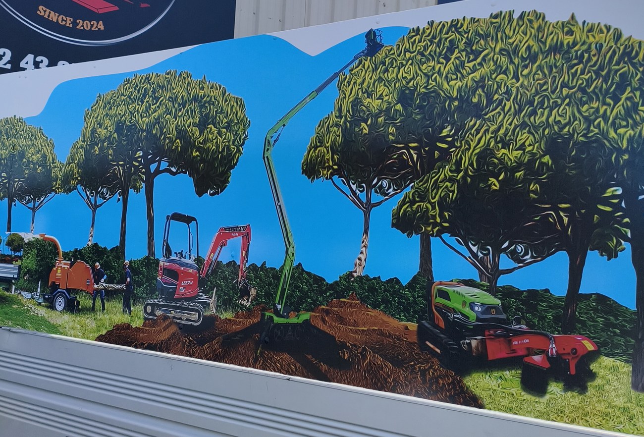 Panneau du camion-benne EPTM Paysages — détail visuel matériel et arbres